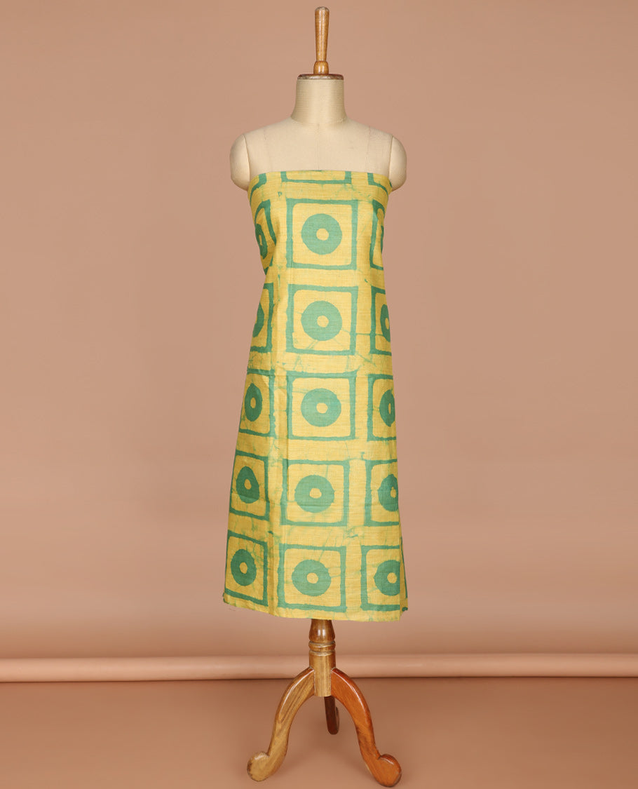 Lemon yellow with green geometric batik print bhagalpur cotton chudidhar material top with batik print cotton pants & batik print mul mul dupatta