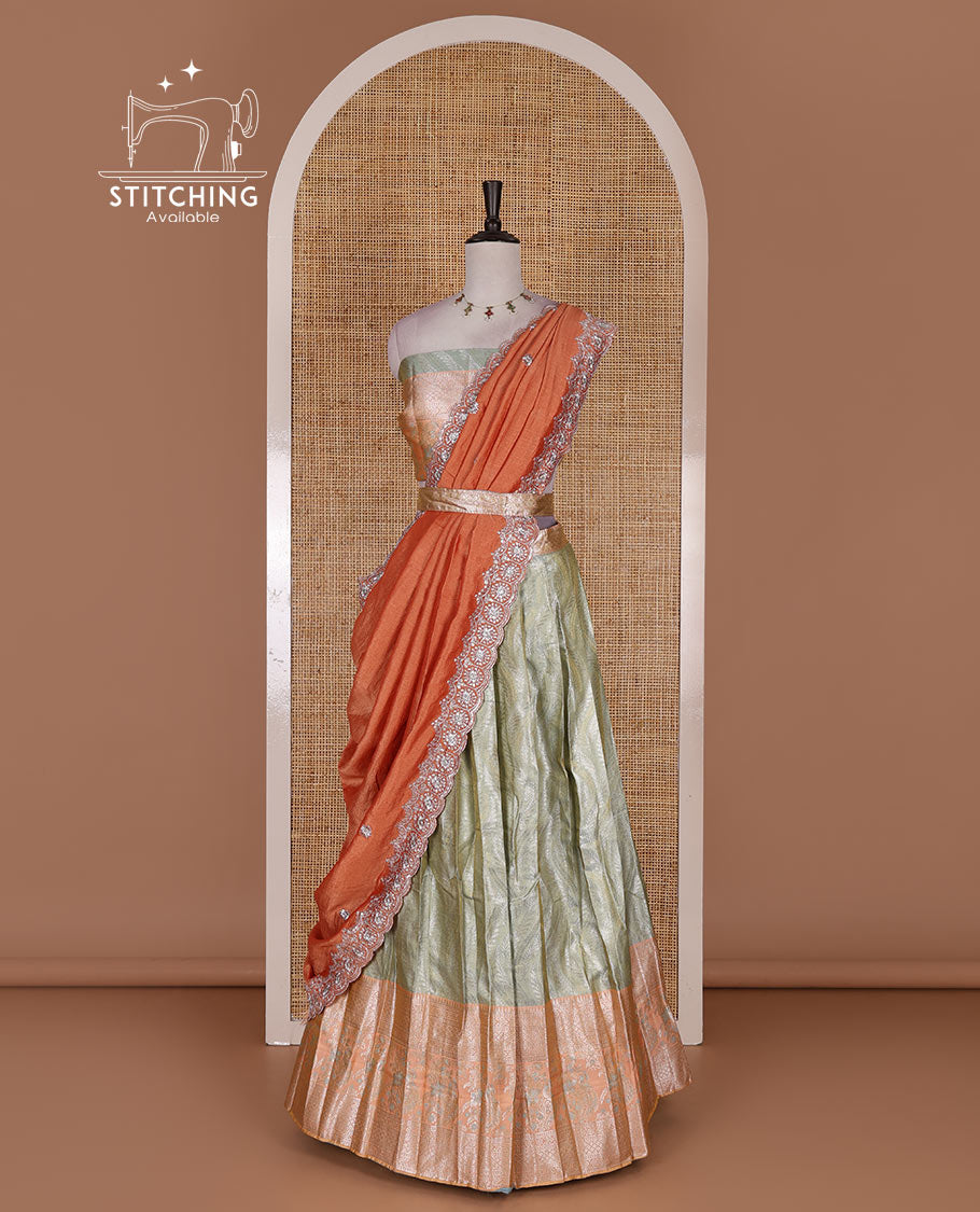 Pista-peach banaras tissue half saree, jacquard with contrast traditional zari bordered skirt, matching blouse, and Vichitra silk embroidered dhavani