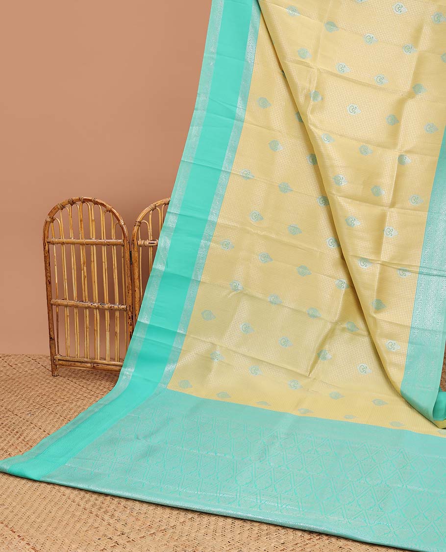 Yellow checked, floral design litchi silk saree with contrast rettai pettu zari design border & checked floral design pallu