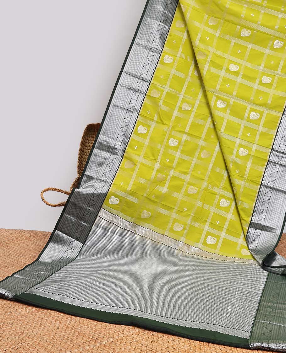 Green paisely enclosed checked design gift saree with contrast intricate zari design border & checked zari design pallu
