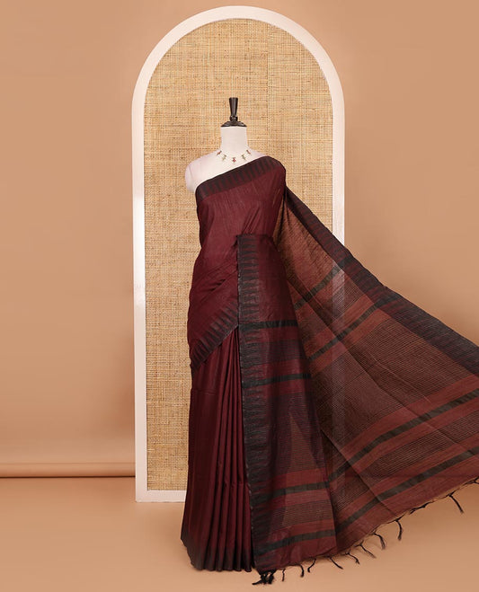 Wine plain staple cotton saree, contrast temple border, striped pallu & vertical striped blouse