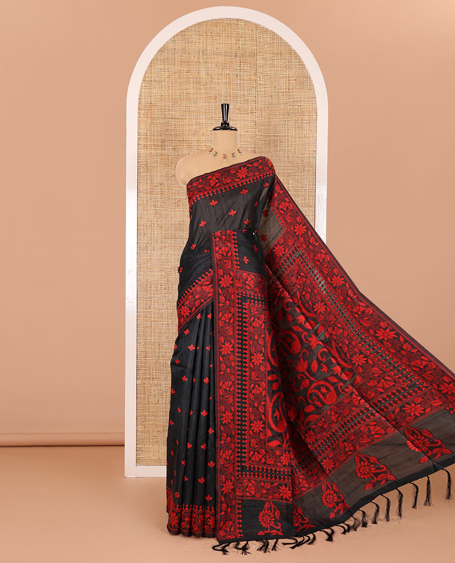 Black and red floral thread buttas woven jute cotton saree, floral thread weave border, floral-paisley weave pallu, and a matching blouse