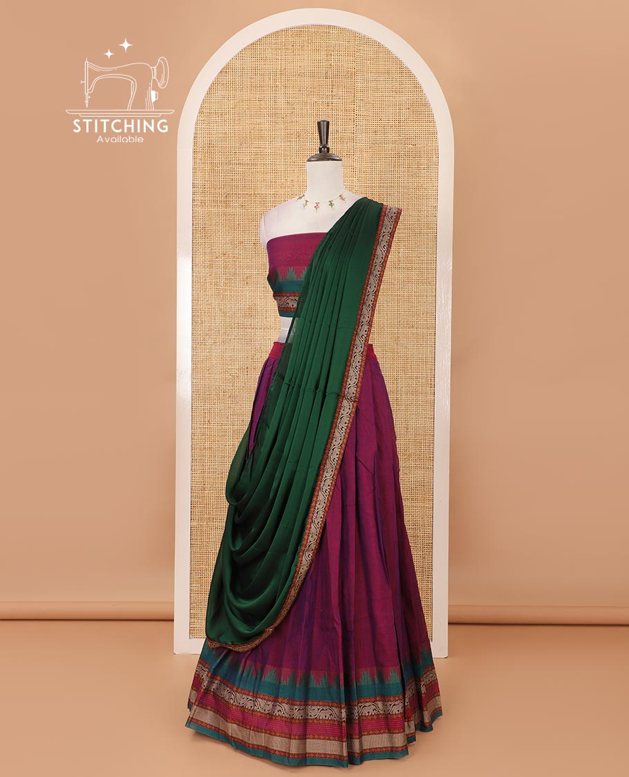 Magenta mercedised cotton half-saree, contrast traditional resham thread border skirt, matching blouse & contrast green thread border georgette dhavani