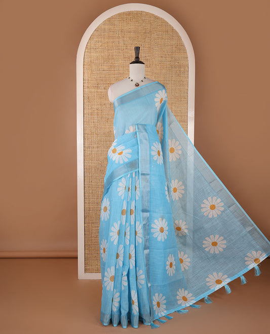 Sky blue sunflower motif printed linen saree, silver zari plain border & small sunflower motif print blouse