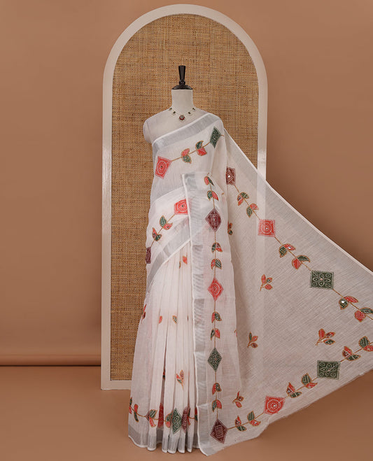 White-base linen saree with zari work & colorful bandhani motifs print, silver zari border & bandhani printed blouse