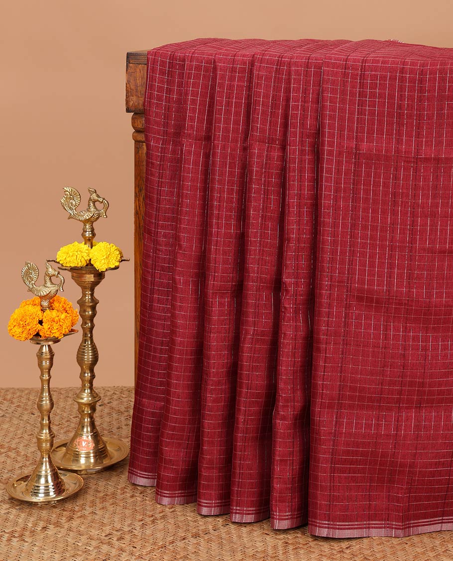 Maroon zari checks linen slub saree with zari piping border & lining pallu along with brocade blouse