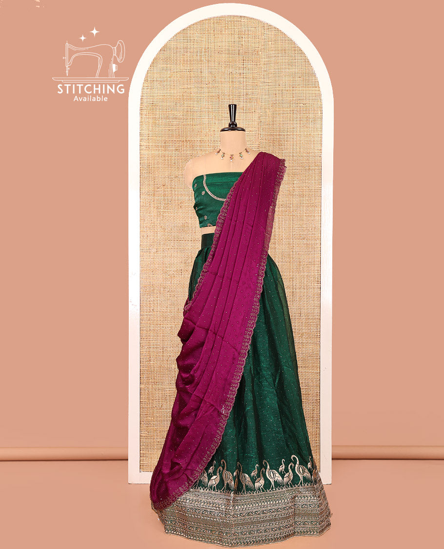 Bottle Green Half-Saree Set, Richly Detailed with Stone Work and Bird Motifs Embroidery on Its Satin Georgette Skirt, Highlighted by Embroidered Border, Paired with a Matching Blouse, and Comes with a Contrast Scallop Stone Work Dupatta