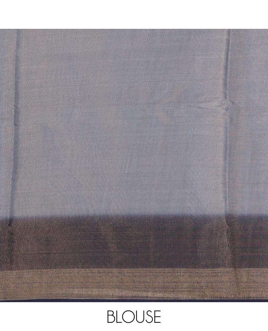 Grey plain tissue saree, contrast gold zari piping border & self pallu with tussels