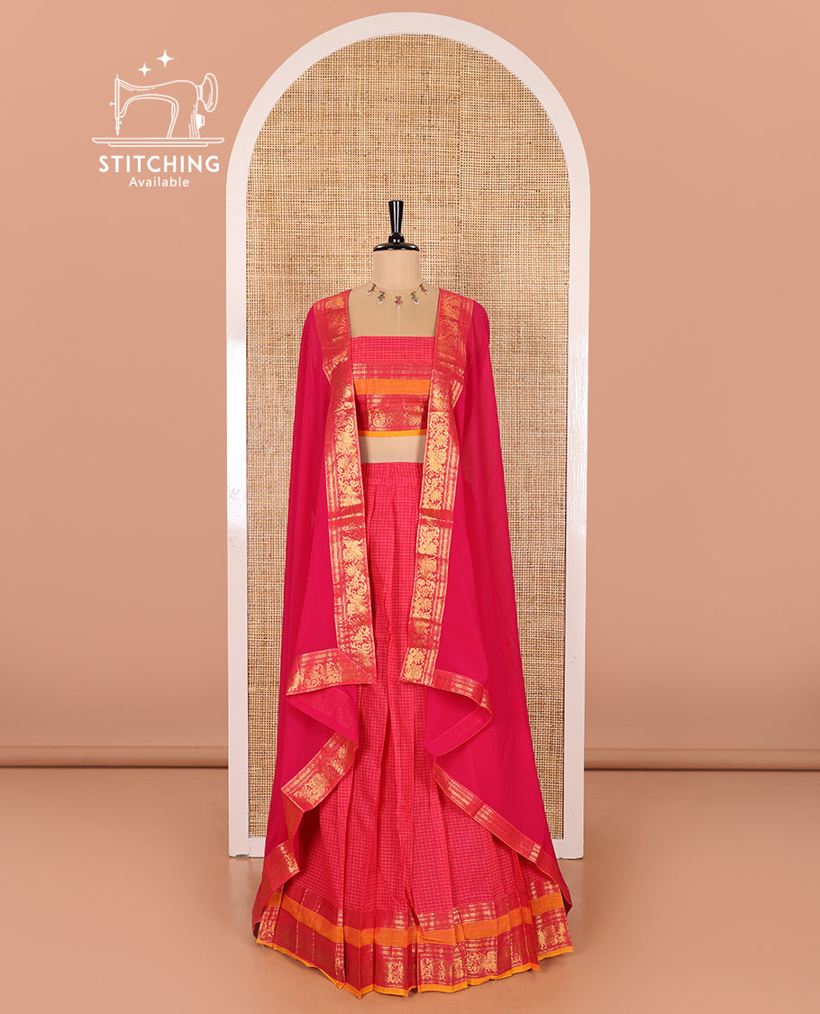 Rani Pink and Yellow Chettinad Cotton Half-Saree Featuring Checked Skirt, Highlighted with a Contrast Rettai Pettu Zari Peacock and Rudraksham Motifs Border, a Subtly Woven Matching Blouse, and a Georgette Traditional Zari-Bordered Dhavani