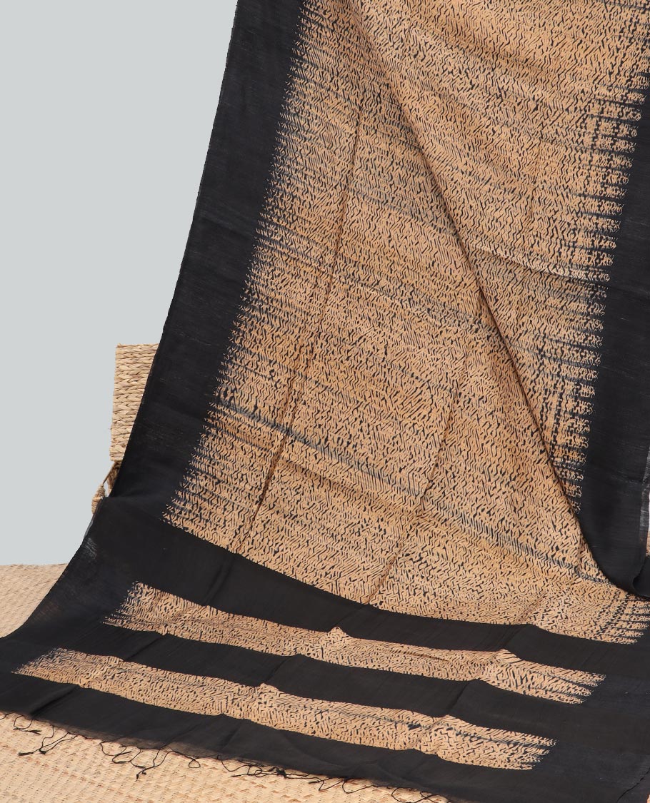 Light brown abstract design matka silk saree with contrast plain border & black abstract design pallu