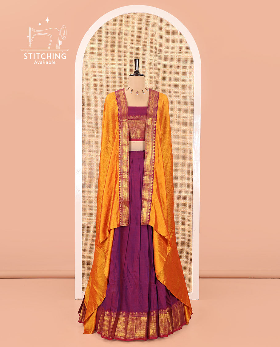 Magenta Mercerised Cotton Half-Saree Features Plain with Contrast Traditional Zari Temple Bordered Skirt, Paired with a Matching Blouse, and Comes with a Contrast Zari-Bordered Dhavani