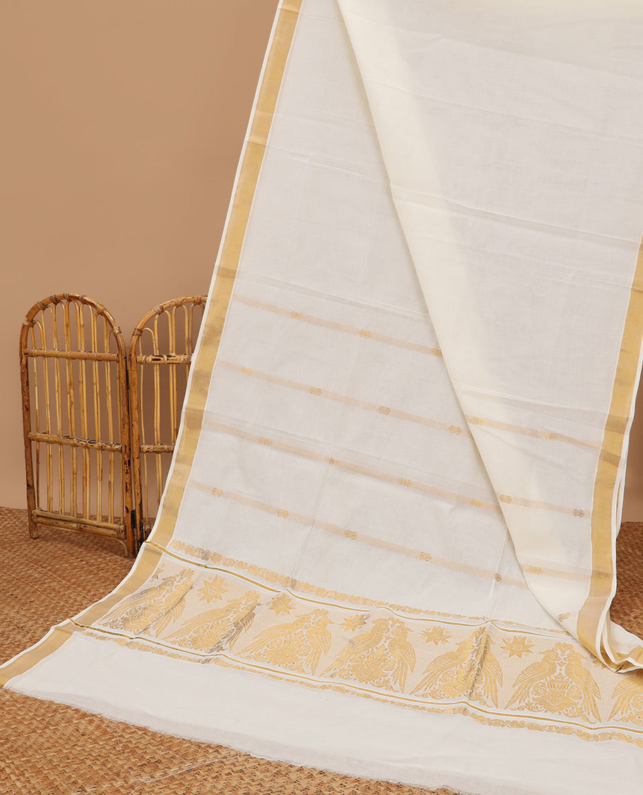 Cream kerala saree with zari designs, plain border & pallu of intricate zari designs