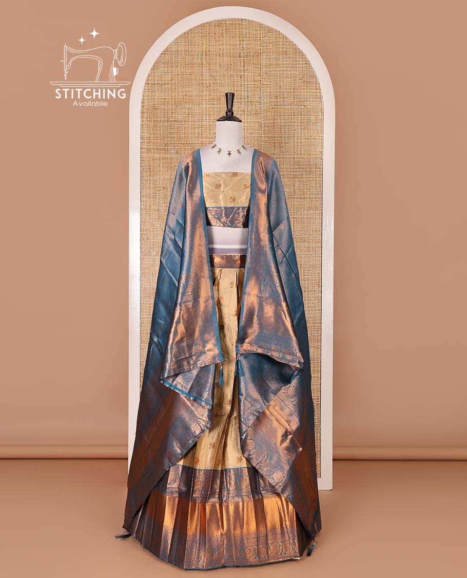 Gold banaras half saree, zari buttas with contrast blue traditional zari border skirt, matching blouse, dhavani of zari checks, and buttas