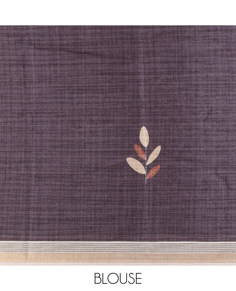 Cream leaf themed printed soft tussar saree, contrast golden zari horizontally striped border, dual color textured pallu, and contrast plain blouse