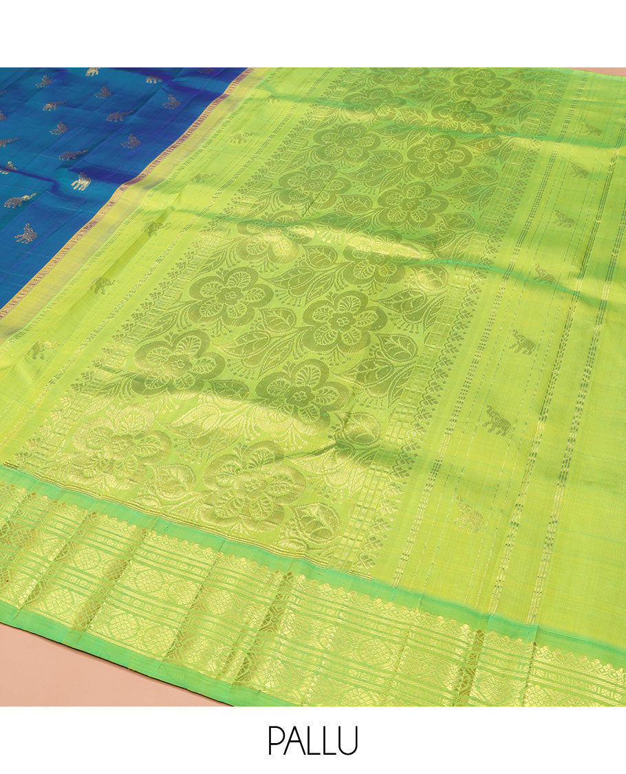 Blue Kanchipuram Silk Saree, Bedecked with Yaanai Buttas, Complemented by Contrast One-Sided Checked Border of Thazanpoo Rekku, Salngai, Banaras, Lavangam, and Laddu Kamalam Designs, Pallu of Floral Designs, and Comes Without a Blouse