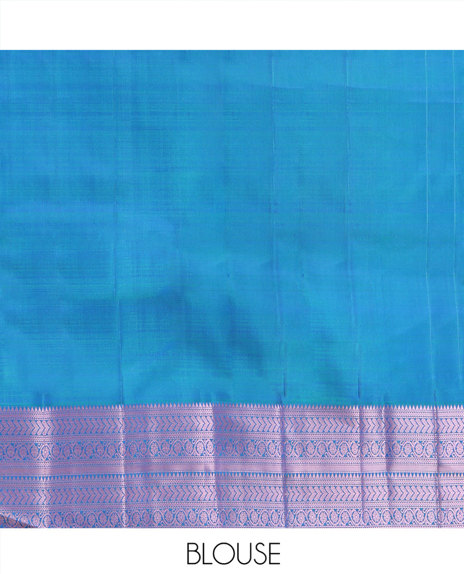 Blue Kanchipuram Silk Saree, Graced with Mayil and Chakram Thread Buttas on Its Body, Highlighted by a Self-Border of Rekku, Neli, Kathir, and Kodi Visiry Designs, Pallu of Jaal Designs, and Paired with a Matching Blouse