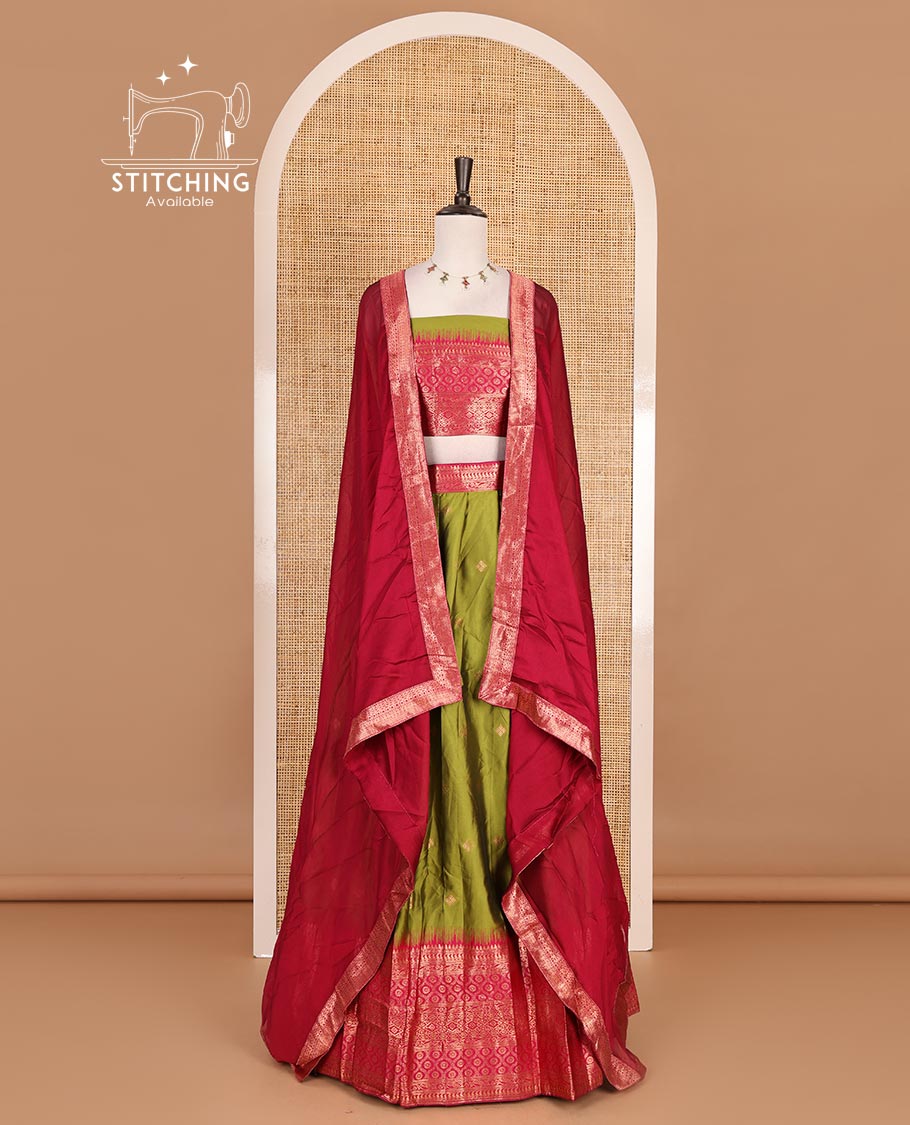 Green taffeta silk half saree, zari buttas with contrast red traditional zari border skirt, matching zari design blouse, and contrast plain zari border syska georgette dhavani