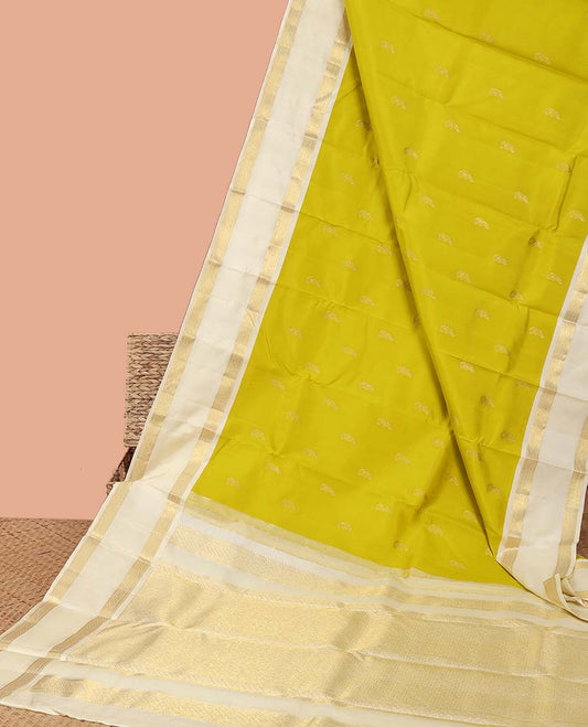 Green paisley buttas kancheepuram silk saree with contrast intricate zari border & traditional zari pallu