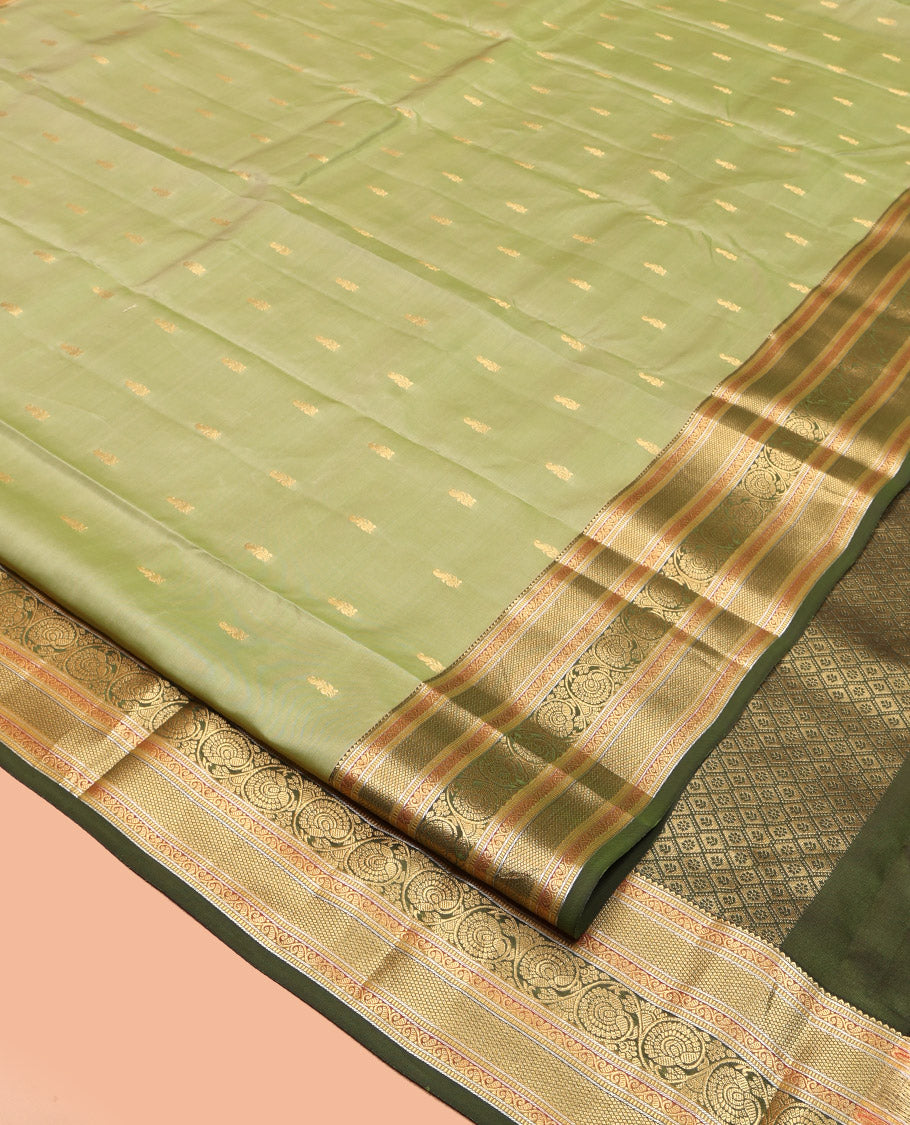 Green Vasundhara Lite Silk Mix Saree, Adorned with Zari Buttas, a Contrast Border of Rekku, Muthu, Kodi Visiry, and Mayil Kann, Jaal Pallu, and a Contrast Blouse