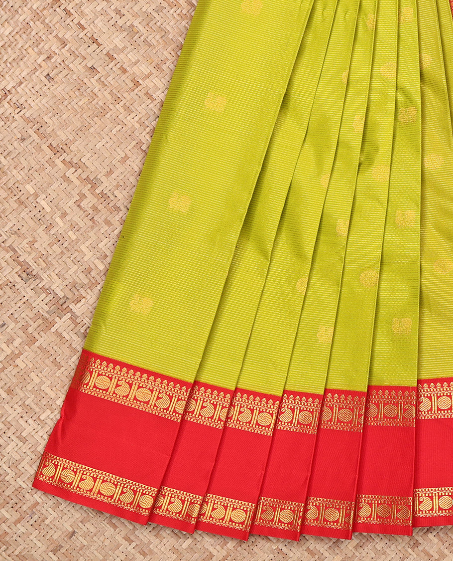 Green Budget Silk Saree, Sparsely Sparkled with Zari Buttas and Stripes, Complemented by a Contrast Traditional Zari Rettai Pettu Border, Grand Jaal Pallu, and a Contrast Blouse