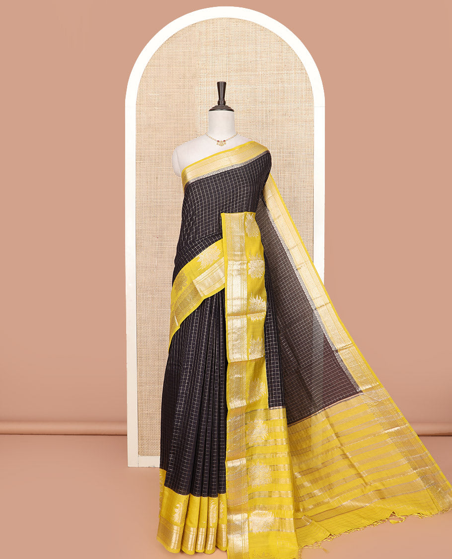 Black Assam Silk Saree Subtly Sparkled with Zari Checks, Complemented by Contrast Traditional Zari Border of Floral Designs, a Captivating Pallu of Zari Stripes, and Paired with a Contrast Blouse