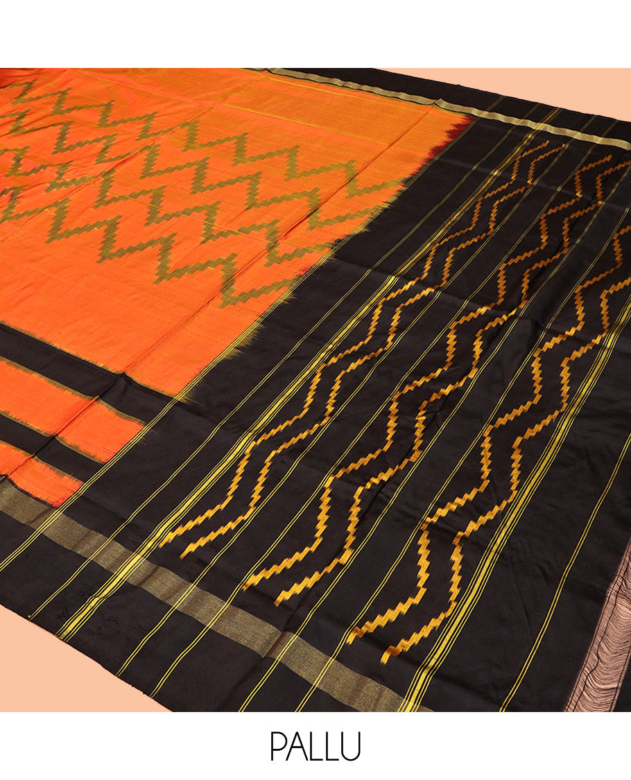 Orange Pochampally Ikat Silk Saree, Decked Up with Chevron Stripes, Complemented by a Contrast Border, Chevron Striped Pallu, and a Contrast Blouse
