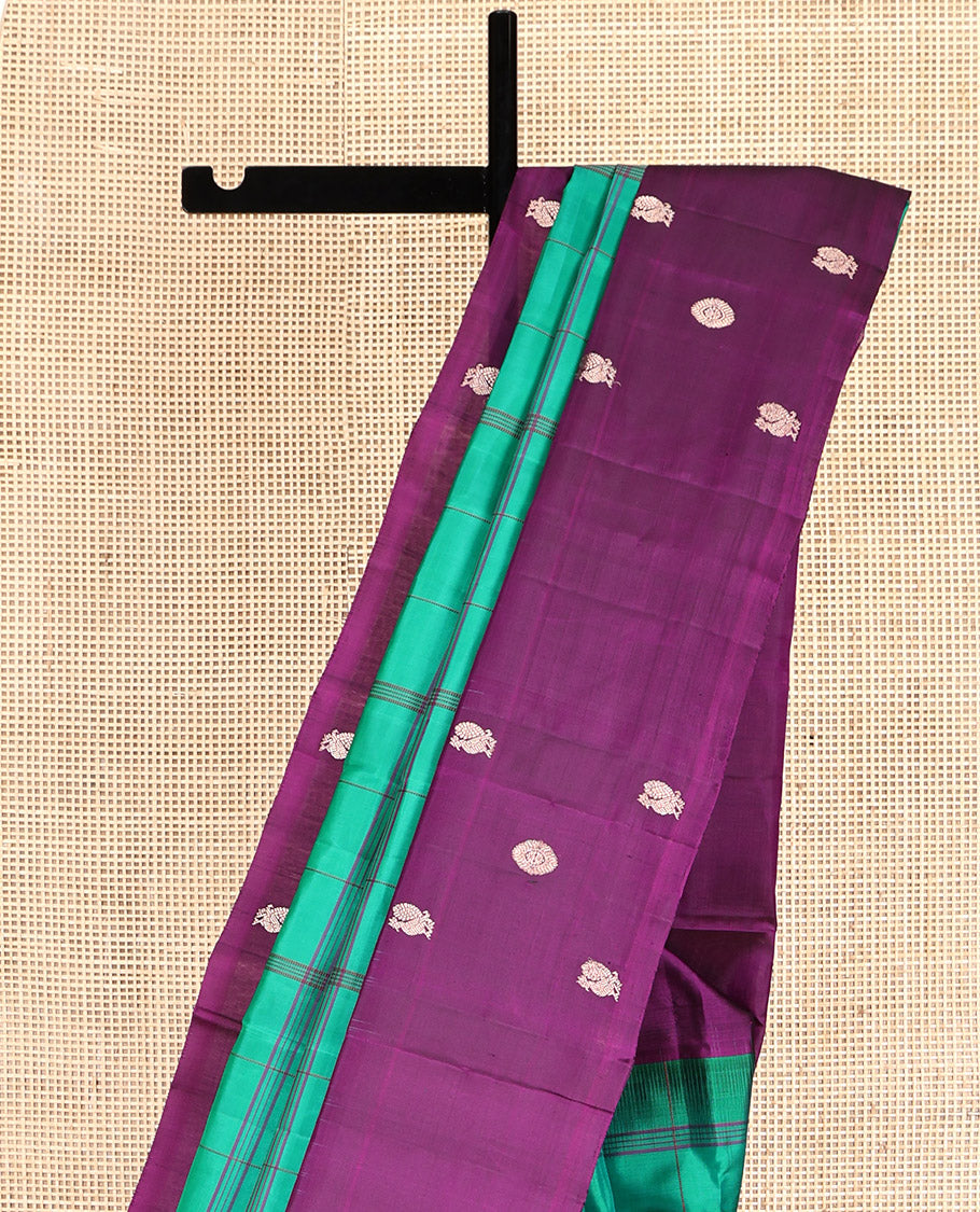 Green Checked Kanchipuram Silk Saree, Complemented by a Contrast Mayil-Chakram Border, Pallu of Butta Enclosed Checks, and a Contrast Blouse