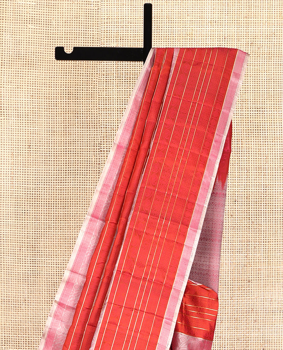 Borderless Orange Mayuri Soft Silk Saree, Elevated with Stripes and Elephant Motifs, Pallu Steeped with Geometric Patterns, and Paired with a Contrast Blouse