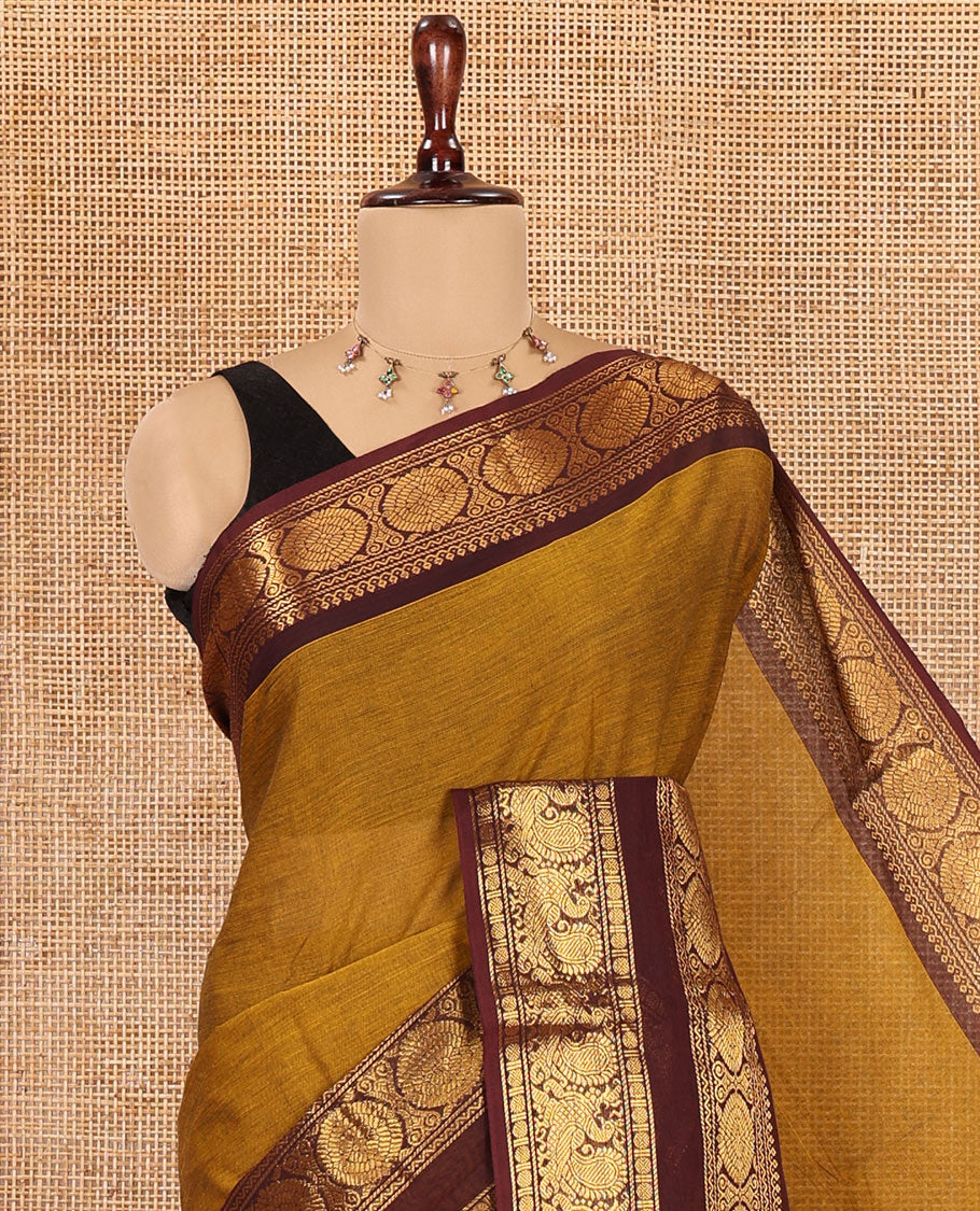 Mustard Chettinad Cotton Saree, a Contrast Peacock-Chakra Rettai Pettu Border, Striped Pallu, and Matching Blouse