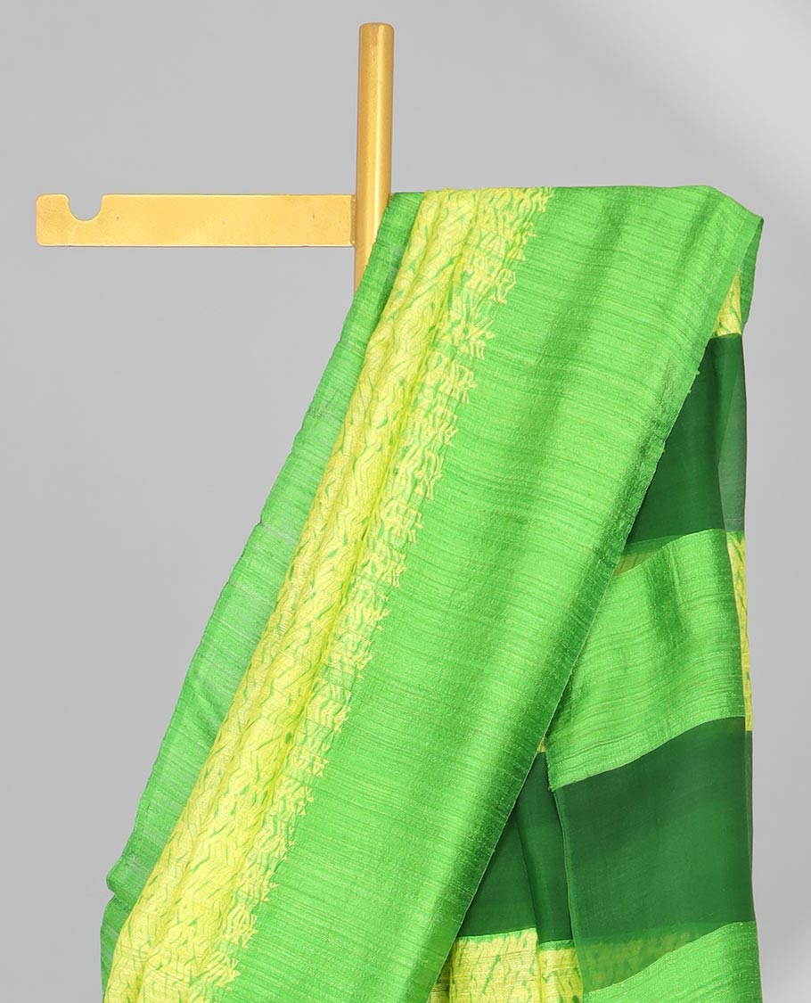 Green abstract design matka silk saree with contrast plain border & green abstract design pallu