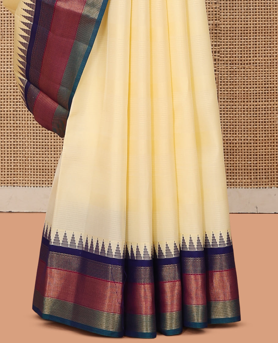 Cream Bangalore Silk Saree, Complemented by a Contrast Temple Border, Pallu of Geometric Designs, and a Contrast Blouse