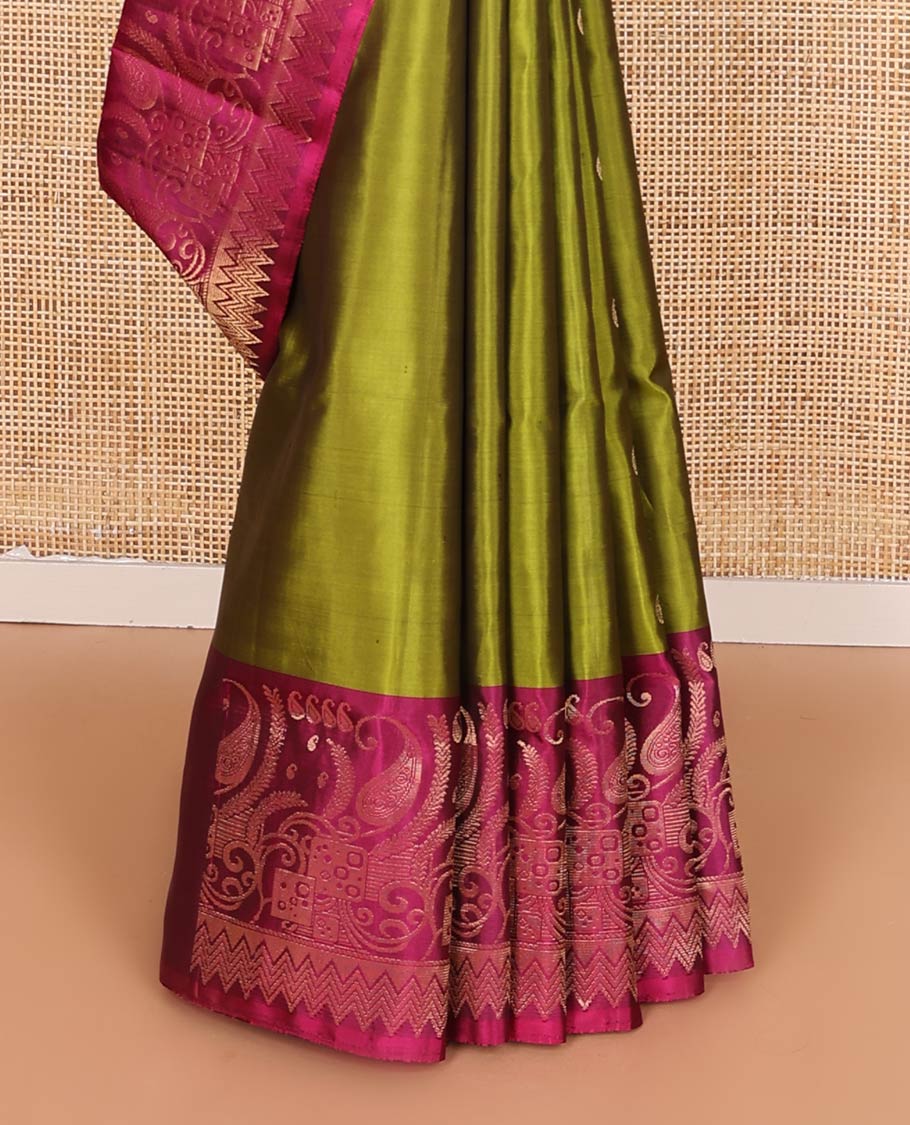 Green manga buttas soft silk saree, contrast border, and pallu of intricate zari designs