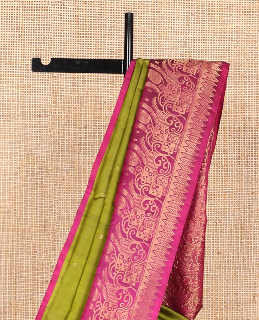 Green manga buttas soft silk saree, contrast border, and pallu of intricate zari designs