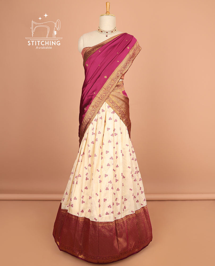 Cream buttas half saree with contrast zari design border, zari design blouse & dark pink floral vine zari design dhavani
