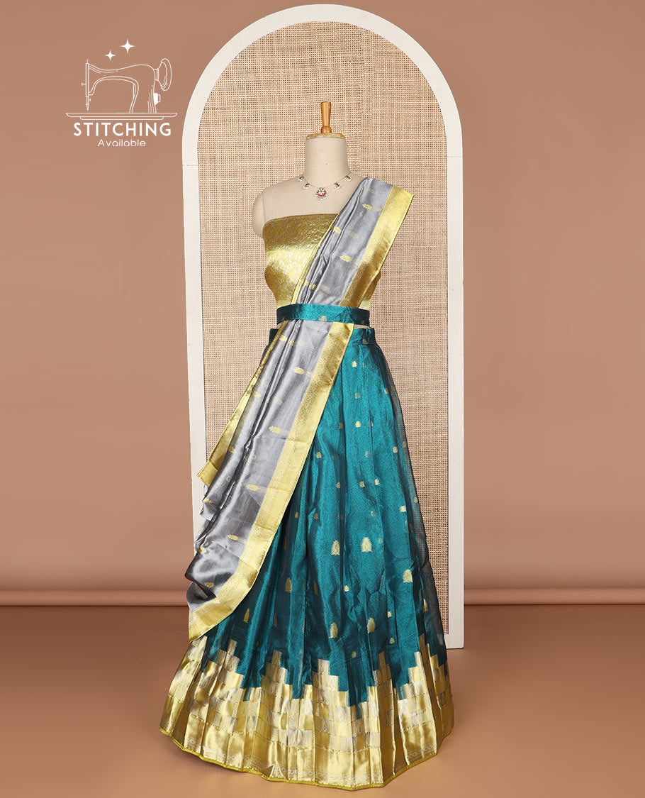 Blue geometric design tissue half saree with contrast temple border, zari design blouse & floral design dhavani