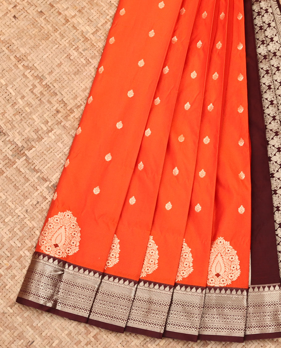 Orange Budget Silk Saree, Accentuated with Zari Buttas All Over Its Body, Complemented by a Contrast Traditional Zari Design Border, Intricately Designed Pallu, and Paired with a Contrast Blouse