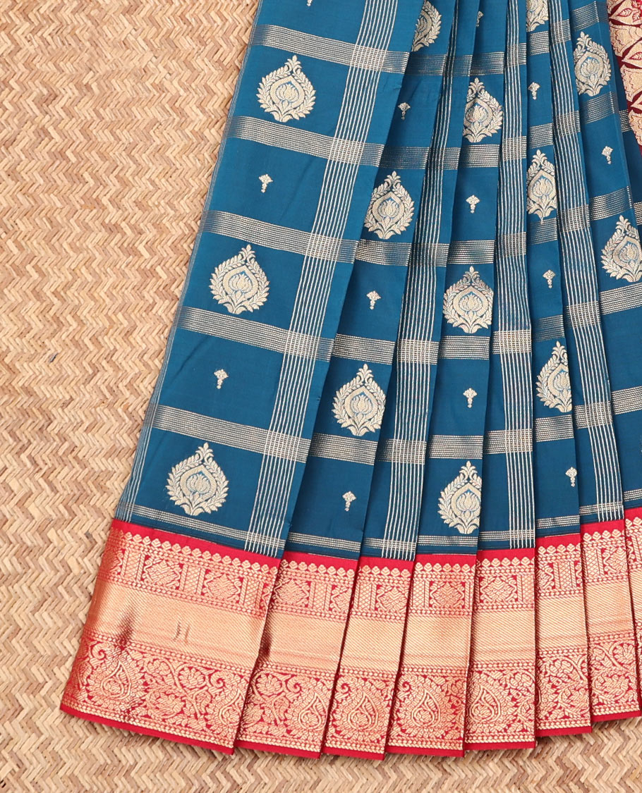 Blue Budget Silk Saree, Majestically Detailed with Zari Butta Enclosed Checks on Its Body, Complemented by a Contrast Traditional Zari Design Border, Intricately Designed Pallu, and Paired with a Contrast Blouse