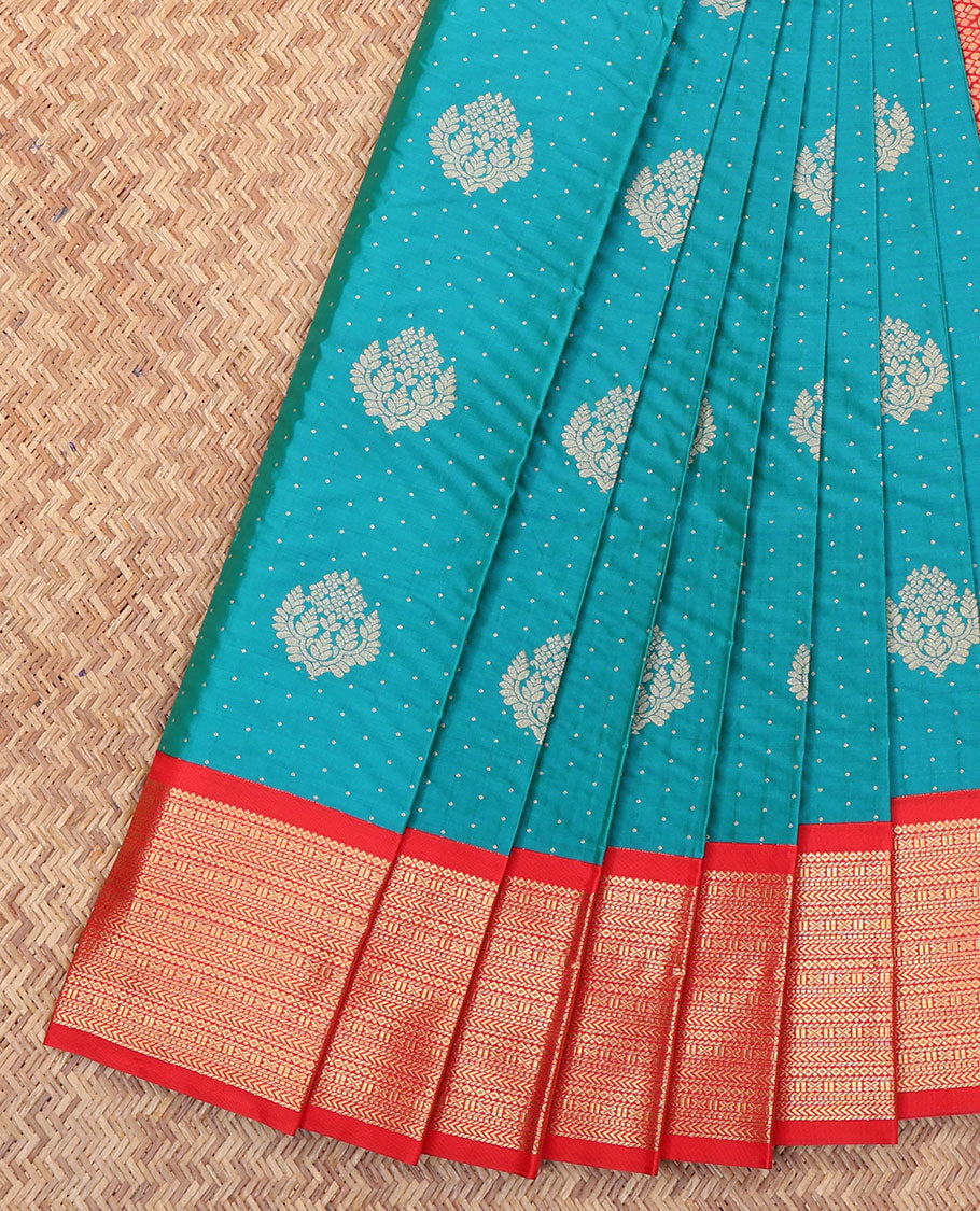 Peacock Blue Budget Silk Saree, Decorated with Zari Buttas All Over Its Body, Complemented by a Contrast Traditional Zari Design Border, Intricately Designed Pallu, and Paired with a Contrast Blouse