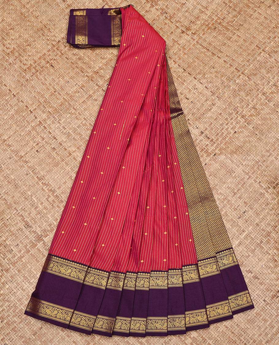 Red Budget Silk Saree, Subtly Sparkled with Buttas and Stripes All Over Its Body, Complemented by a Contrast Traditional Zari Design Rettai Pettu Border, Grand Jaal-Patterned Pallu, and Paired with a Contrast Blouse