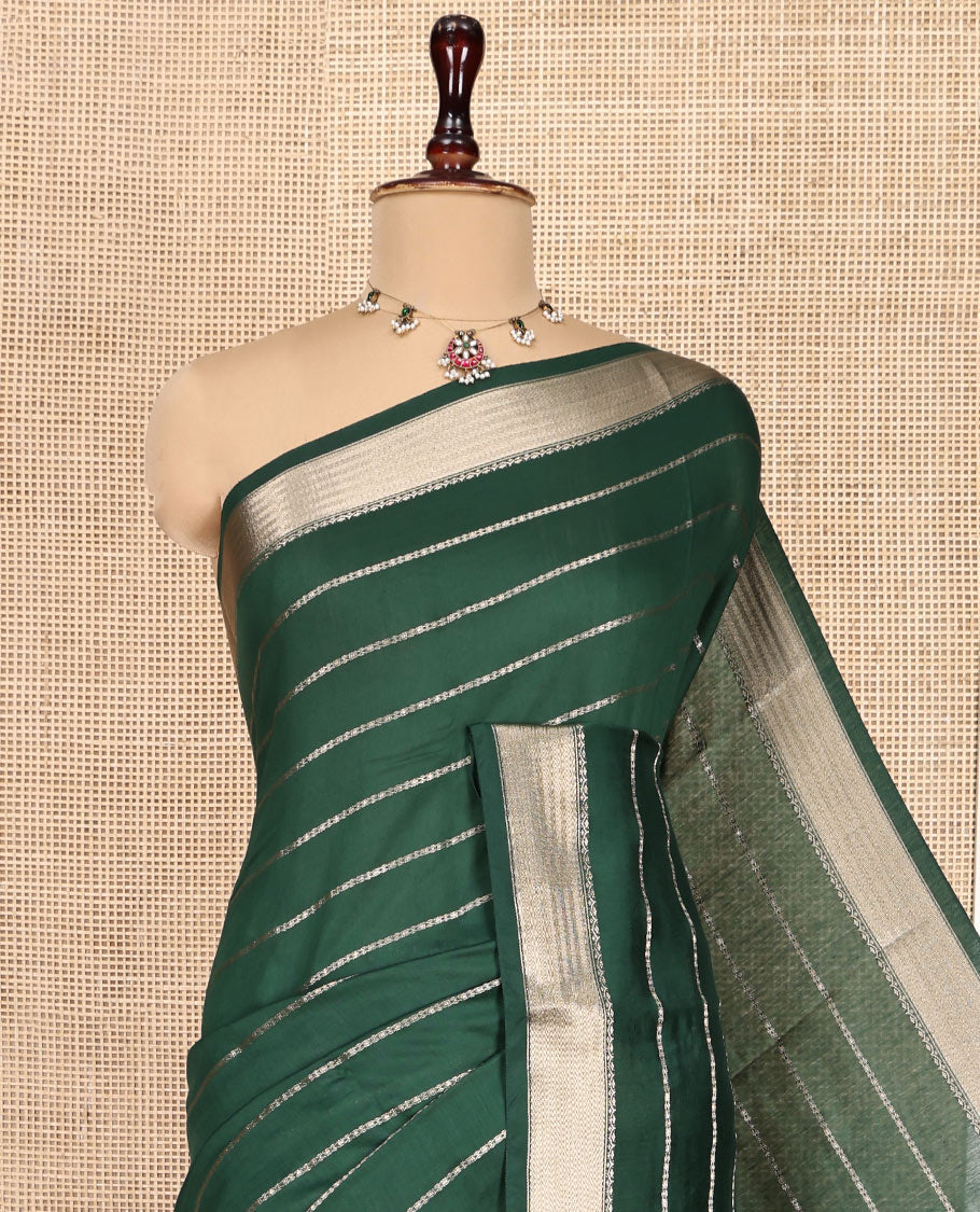 Green Assam Silk Saree, Embellished with Zari Stripes, a Traditional Zari Border, a Pallu Steeped with Zari Stripes
