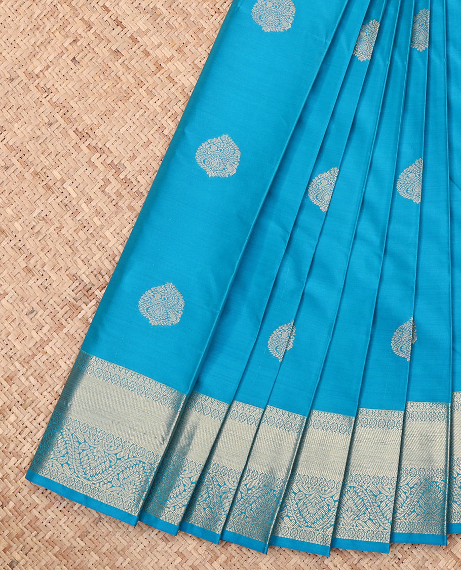Light Blue Budget Silk Saree, Graced with Zari Buttas, Highlighted by a Traditional Zari Border, Intricate Pallu, and Matching Blouse