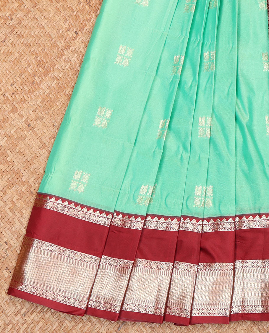 Turquoise Budget Silk Saree, Meticulously Woven with Zari Buttas All Over Its Body, Complemented by a Contrast Traditional Zari Design Woven Rettai Pettu Border, Gleaming Jaal Pallu, and Paired with a Contrast Blouse