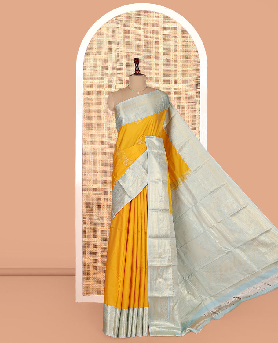 Yellow Budget Silk Saree, Sparsely Threaded with Zari Buttas on Its Body, Complemented by a Contrast Traditional Zari Design Border, Grand Zari Woven Pallu, and Paired with a Contrast Blouse