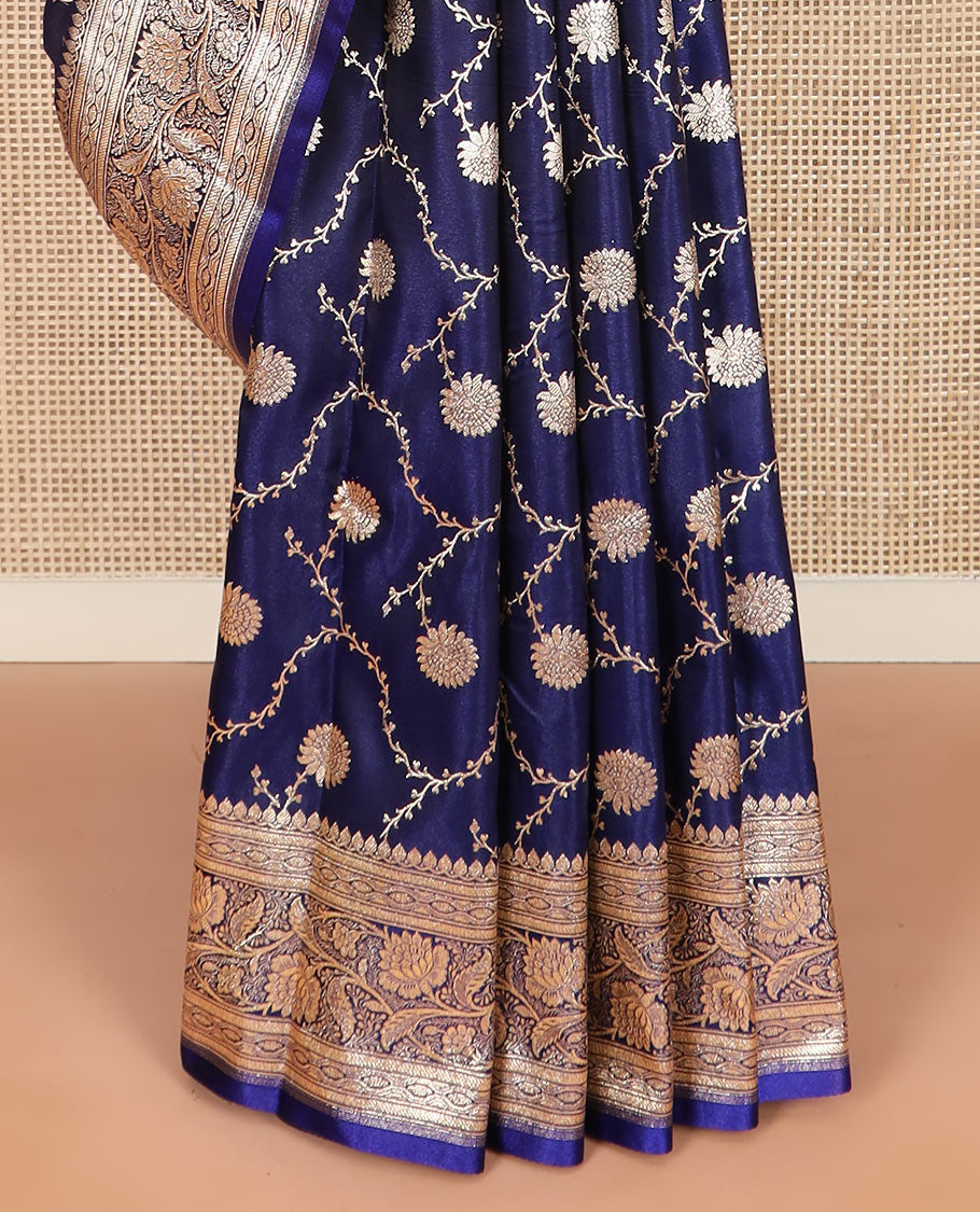 Navy blue floral jaal jacquard banarasi silk saree, contrast floral creeper design border, and intricate ogee patterned pallu