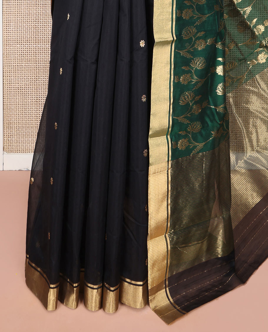 Black Chanderi Cotton Saree, Ornamented with Floral Buttas All Over Its Body, Highlighted by Zari Border, Complemented by Contrast Pallu of Floral Jaal Designs, and Paired with a Contrast Blouse