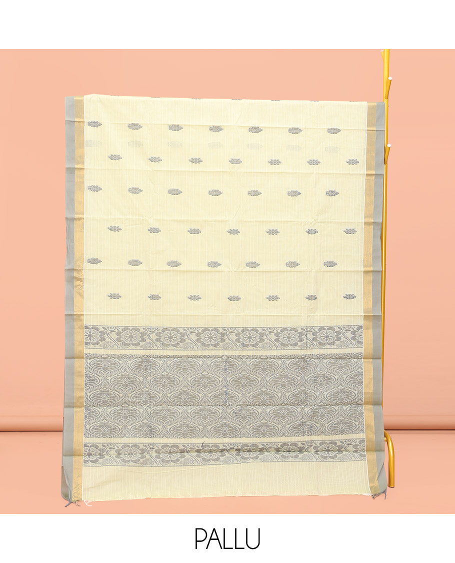 Pale Yellow Kanchi Cotton Saree, Woven with Buttas All Over Its Body, a Complemented by Contrast Border, Pallu of Intricate Designs, and Paired with a Matching Blouse