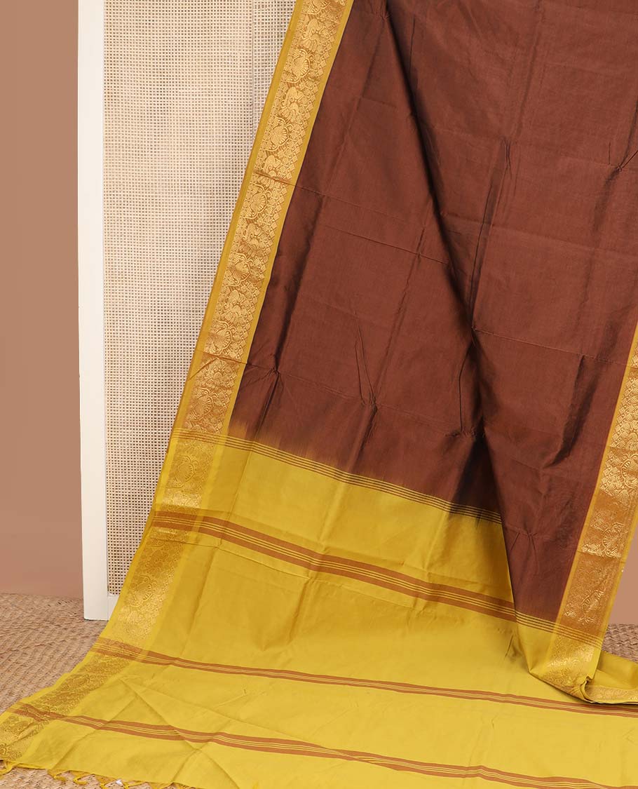 Brown plain design poly cotton saree, contrast traditional zari border, and striped pallu