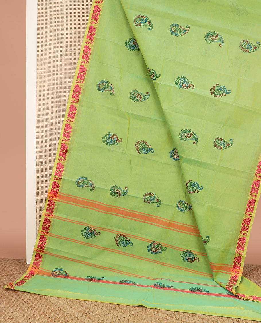 Green paisley buttas Chettinad cotton saree, floral design border, and striped pallu