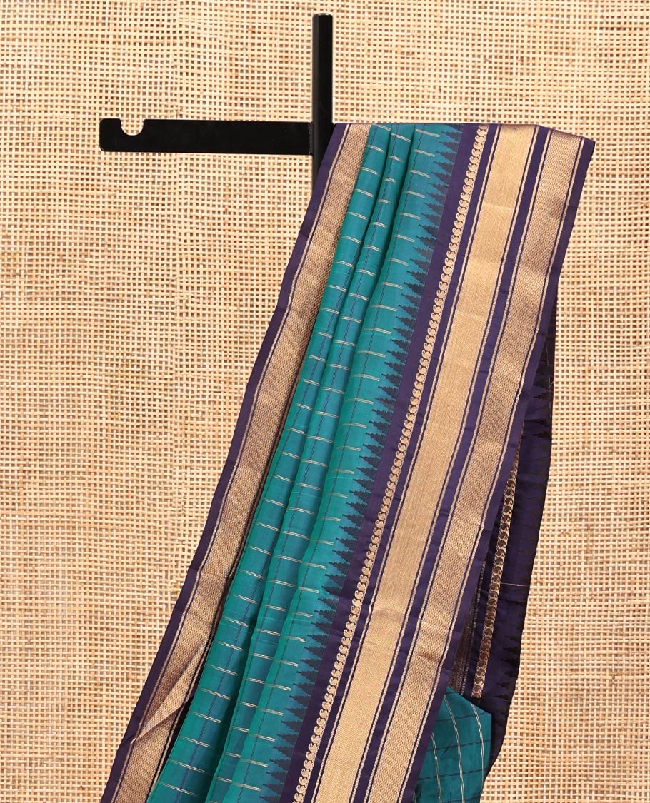 Mayil Color and Navy Blue Vasundhara Lite Silk Mix Saree, Graced with Checked Design All Over Its Body, Complemented by a Contrast Thazampoo Rekku Border of Manga Mokku, Muthu, and Mayil Kann Designs, Grand Pallu, and Paired with a Contrast Blouse