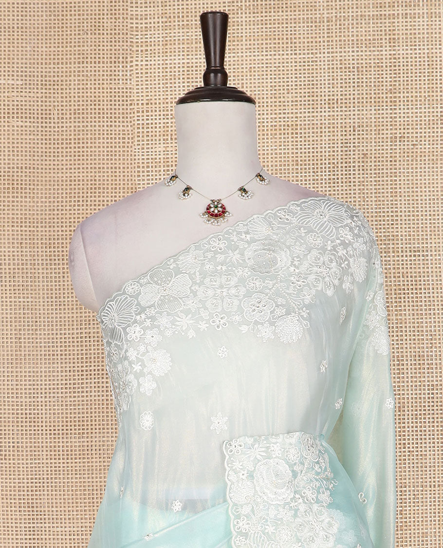 Pastel blue floral embroidered designer organza saree, floral embroidered scallop border